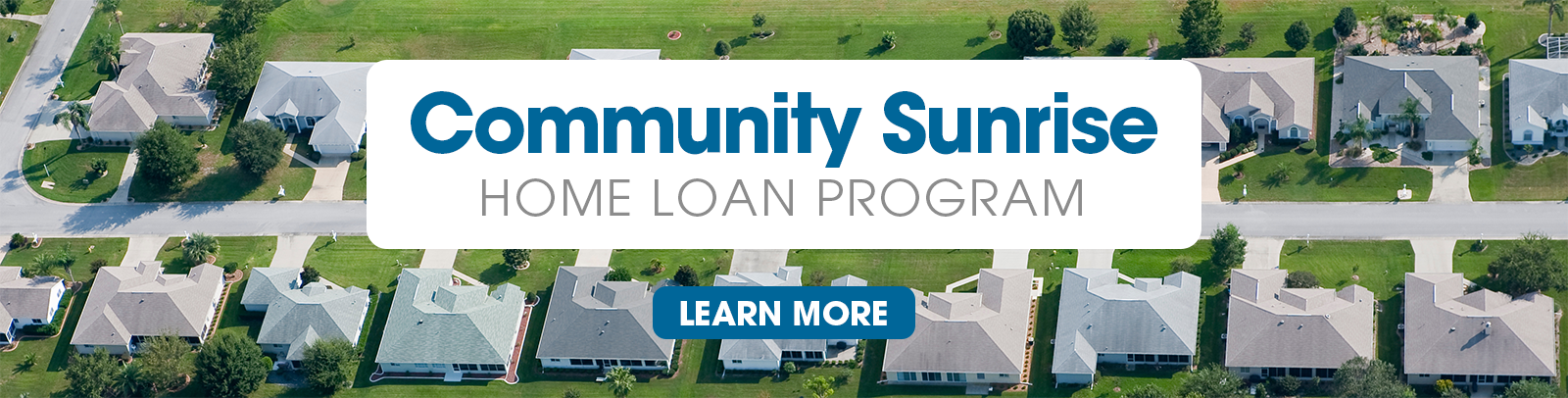 Sunrise home loan program with learn more button over newly developed suburban neighborhood